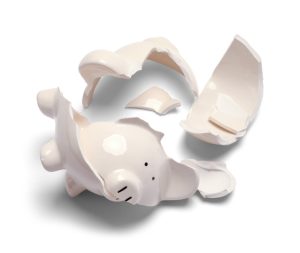 Broken Piggy Bank Isolated on a White Background